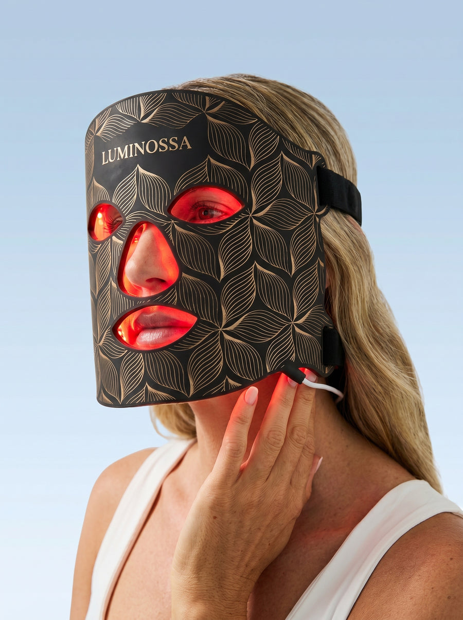 Woman wearing Omnilux LED Face Mask